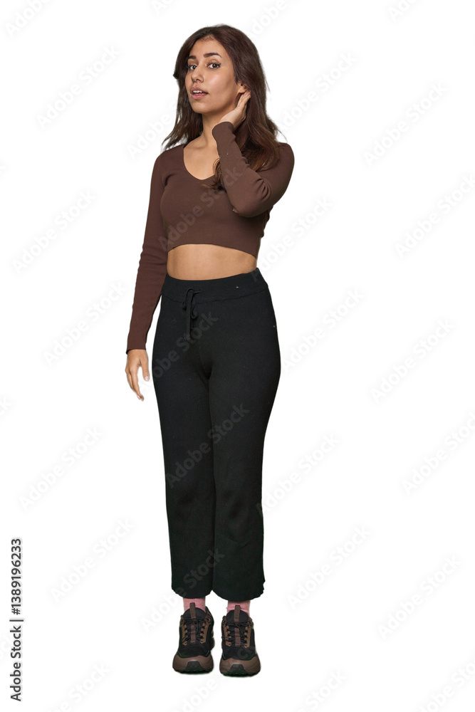 Middle Eastern woman, full body studio trying to listening a gossip. Middle Eastern woman, full body studio trying to listening a gossip.