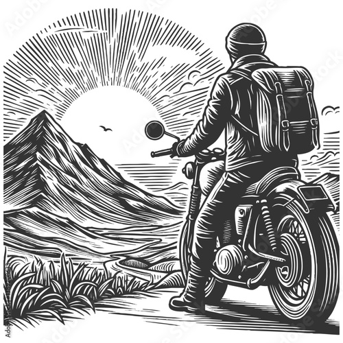 Motorcyclist admiring mountain sunrise landscape
