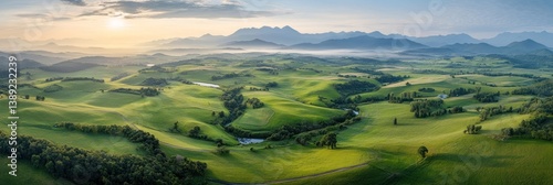 Sunrise over rolling hills