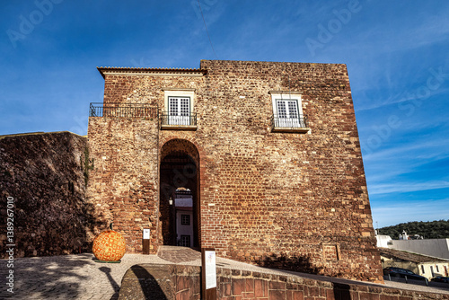 The city gate building, Torreao das Portas da Cidade in the city centre of Silves, Portugal, Europe