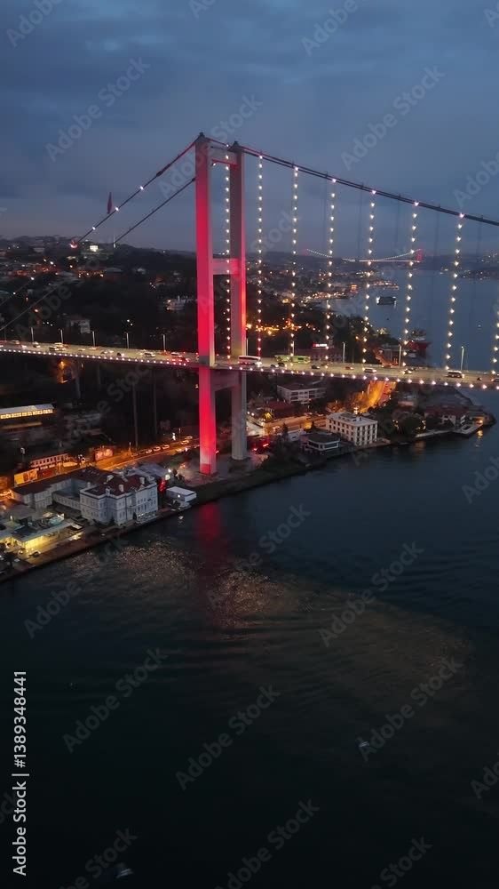 Aerial View of Illuminated Bosphorus Bridge over Marmara Sea by Cityscape during Twilight Aerial View of Illuminated Bosphorus Bridge over Marmara Sea by Cityscape during Twilight