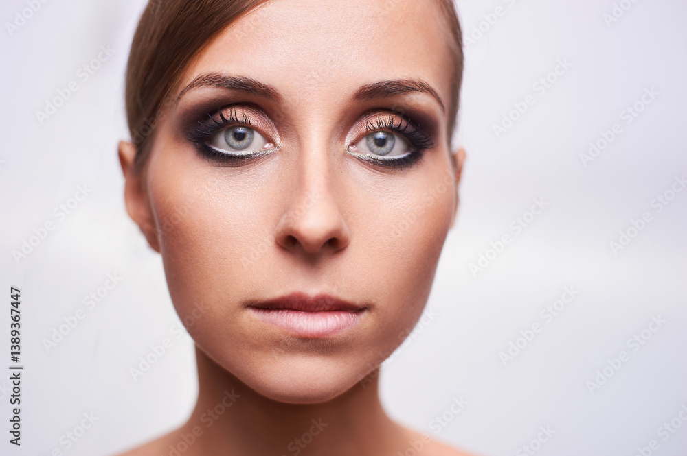 Portrait Of a Woman with Elegant Makeup and Intense Blue Eyes Portrait Of a Woman with Elegant Makeup and Intense Blue Eyes
