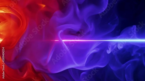 Abstract flowing smoke in red and blue colors against black background. Colorful vapor transforms gradually from bright red to deep blue creating dynamic fluid movement patterns.