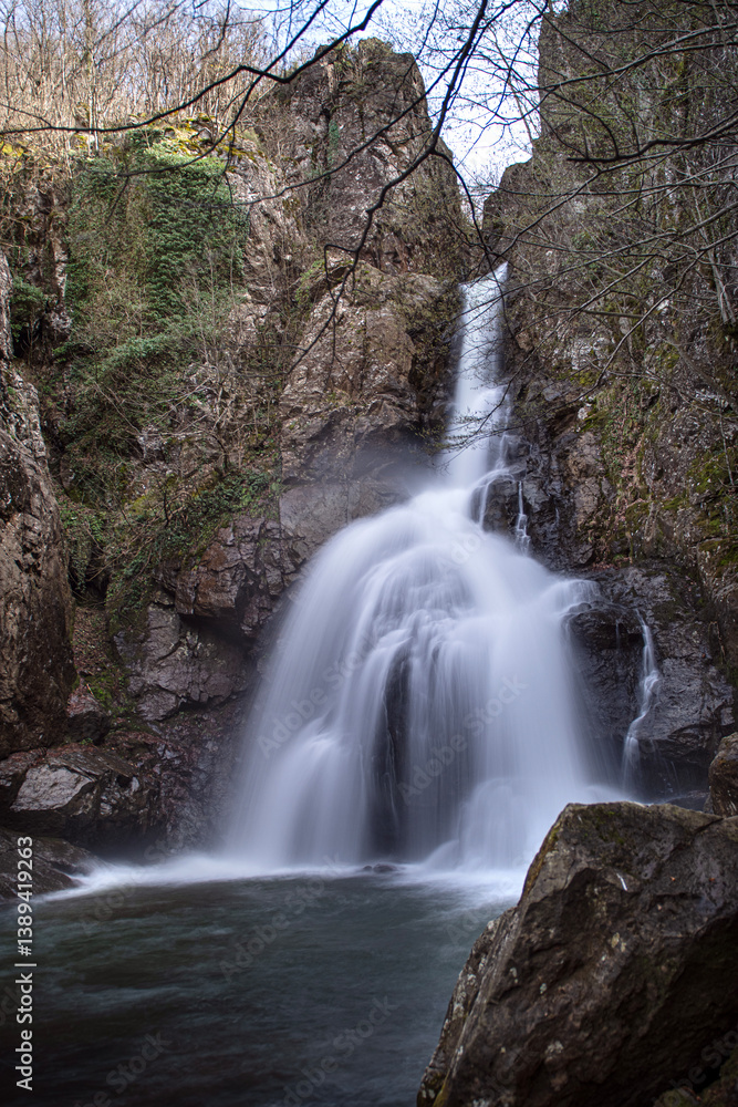 Obraz premium Erikli Waterfall photograph taken with long exposure. Waterfalls in Turkey. Waterfall view in the forest. Erikli Waterfall, Yalova.