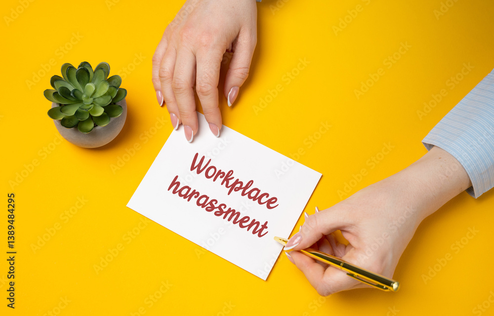 Workplace harassment concept. Unwelcome conduct based on a person's race, color, religion, sex, national origin, older age, disability, or genetic information. A woman writes a note in her notes