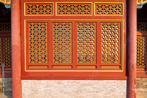 Obraz na płótnie China red palace wood door and Decoration colorful painting beam and wood pole from ancient china palace in the Yonghe Lamasery (Lama Temple), Beijing city, China w salonie
