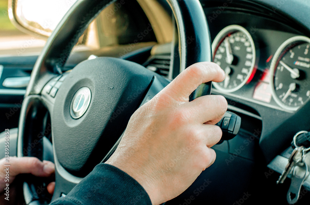 Driver's Hands on Steering Wheel Inside a Car
Driver's Hands on Steering Wheel Inside a Car