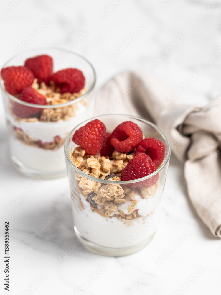yogurt with granola and raspberries yogurt with granola and raspberries