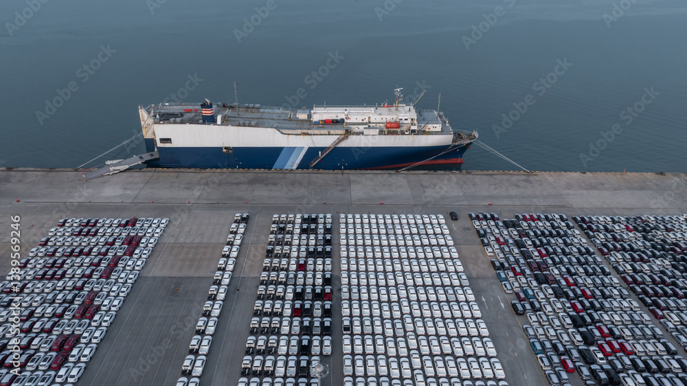Top view new cars at industrial port import export, New cars park in row stock industrial port parking lot shipping transportation retailer dealership, New cars automotive industry logistics business.