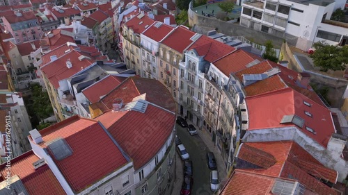 Curvy Street in Lisbon with Azulejo Fascades. Aerial Shot of Traditional Portuguese Houses decorated with Ceramic Tiles