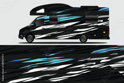 Sleek black and blue camper van design showcasing modern graphics against a neutral background