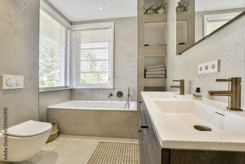 Wallpaper Mural A sleek, modern bathroom featuring a bathtub and a stylish vanity, complemented by natural light and contemporary fixtures for an elegant ambiance. Torontodigital.ca