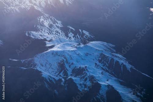Obraz na płótnie Mountains blanketed in clouds, aerial view w salonie