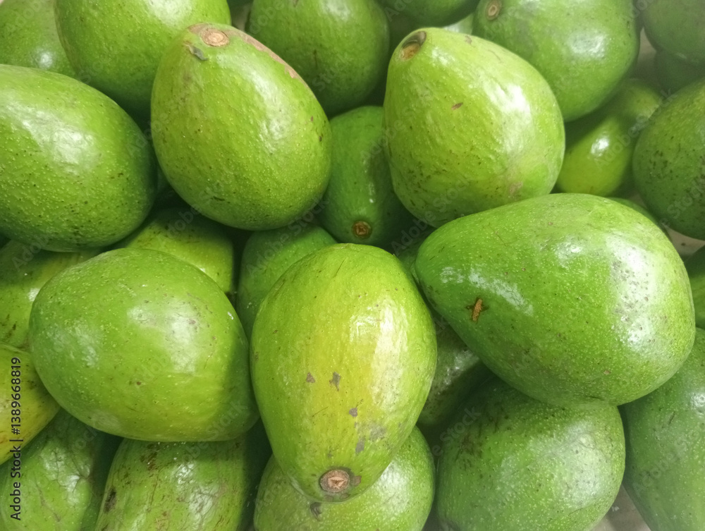 Piles of avocados for sale in supermarkets Piles of avocados for sale in supermarkets