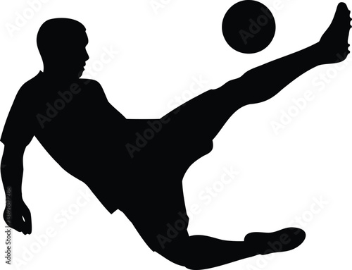 Silhouette of Soccer Player Kicking Ball Mid-Air