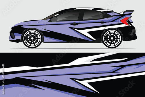 Sleek modified car with dynamic graphics parked against a neutral backdrop, showcasing design details