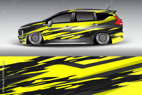 Sleek modified car with striking yellow and black design parked against a gradient gray backdrop