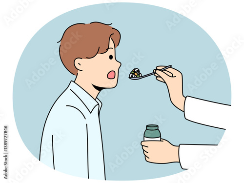 Doctor hand with pills in spoon near patient opening mouth to take painkillers and cure disease. Clinic patient receives pharmacological medications from therapist working in field healthcare.