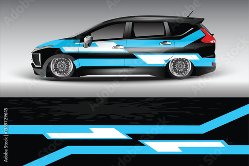 Sleek modified car with vibrant blue and black graphics parked against a minimalist gray background