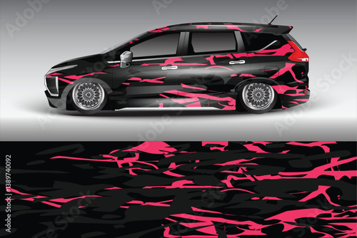Sleek modified car with vibrant pink and black camouflage design parked on a gradient background