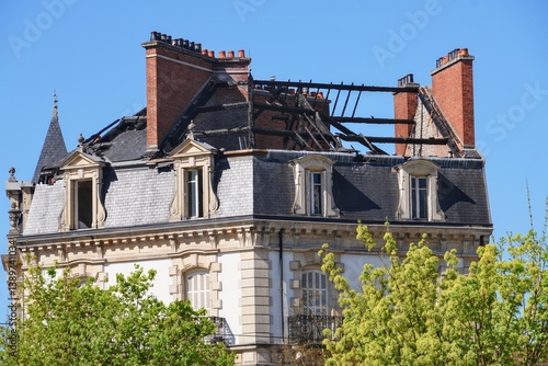 Burned rooftop. Damages caused by fire accident on old european building.