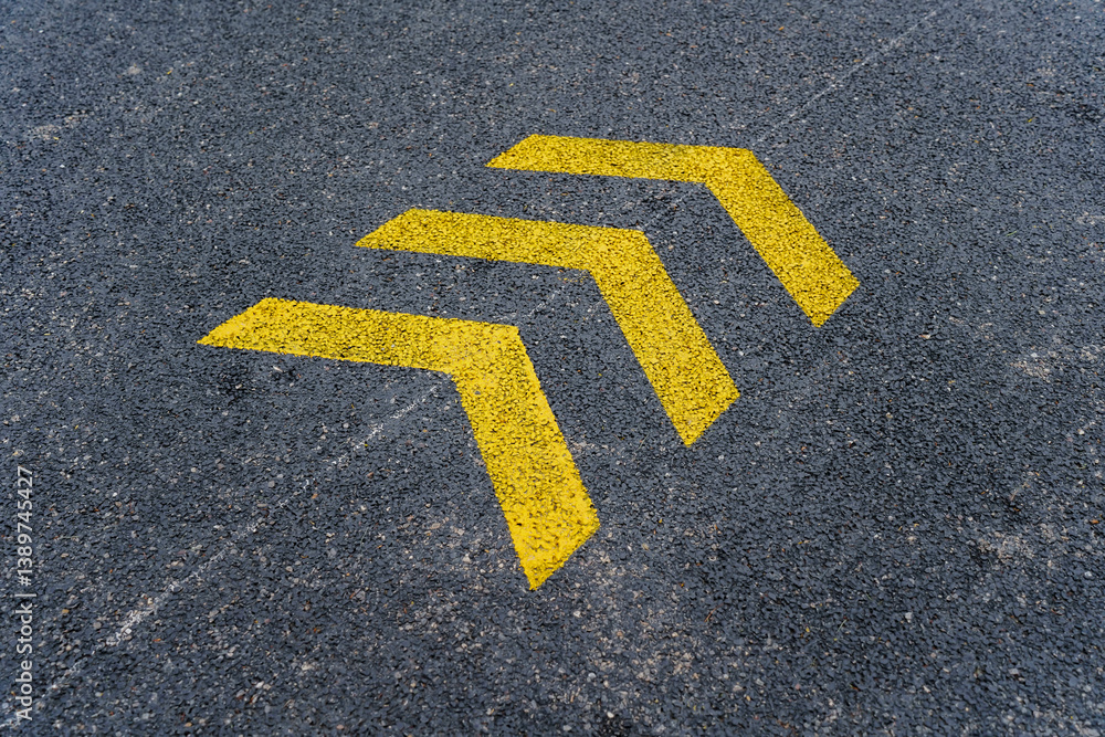 yello arrows pattern for road direction sign