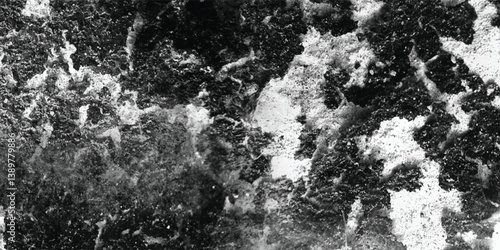 An abstract and visually compelling study of the patterns and irregularities found within a heavily textured expanse.
