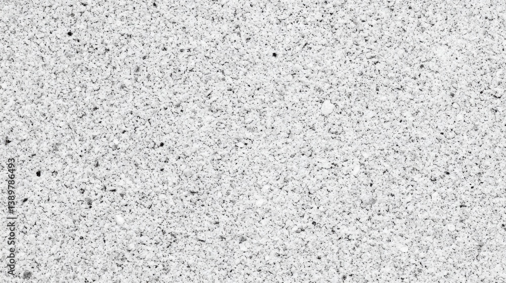 Surface texture featuring a variety of small stones and particles in a neutral tone across a flat background Surface texture featuring a variety of small stones and particles in a neutral tone across a flat background