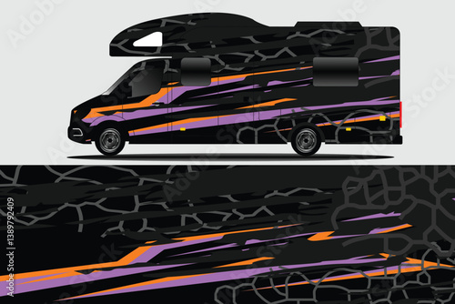 Stylish black camper van with vibrant orange and purple graphic design parked against a plain background