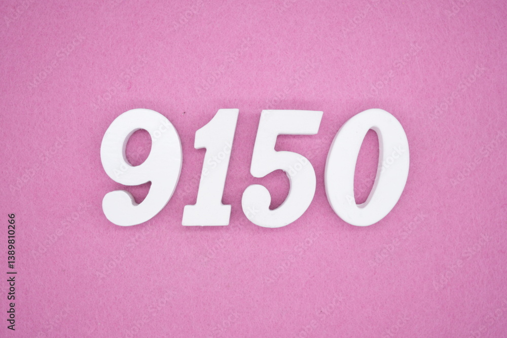 The numbers are made of white painted wood and placed on a pink paper background. The numbers are made of white painted wood and placed on a pink paper background.