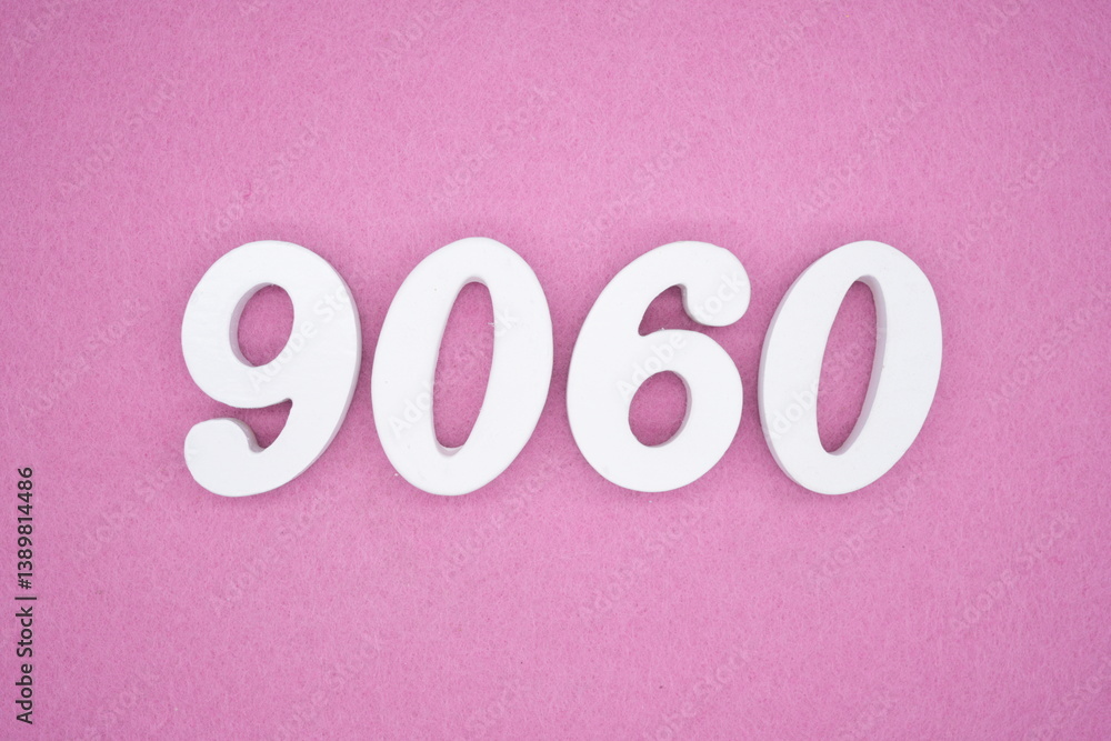 The numbers are made of white painted wood and placed on a pink paper background. The numbers are made of white painted wood and placed on a pink paper background.