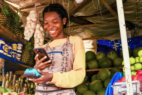excited young sales person accepting digital payment of clients