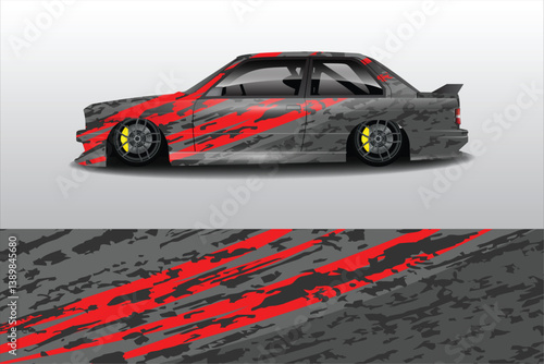 Stylishly Modified Car with Bold Red and Gray Camouflage Design, Set Against a Minimalist Background