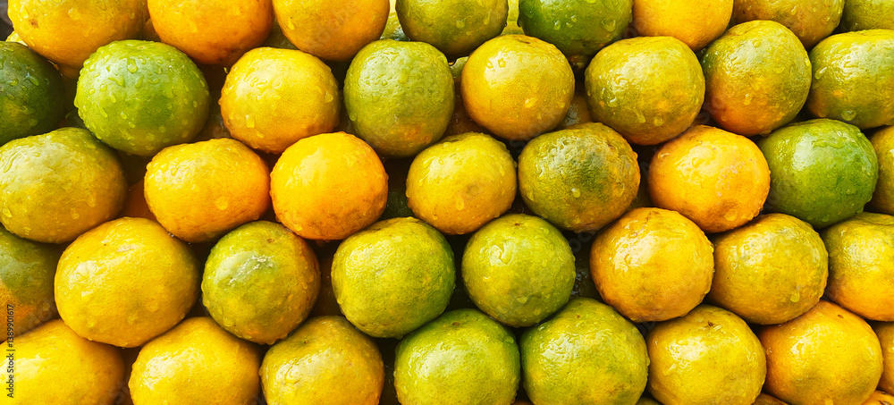 A pile of fresh oranges open sell in Indian market. A pile of fresh oranges open sell in Indian market.