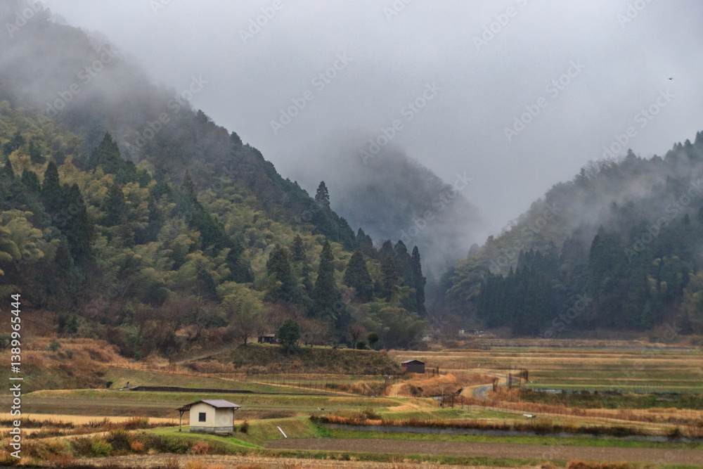 Fototapeta premium Misty Morning in a Quiet Mountain Valley in Rural Kyoto, Japan