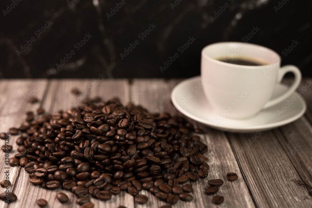 Fototapeta premium Arabica coffee beans, a cup of espresso coffee.