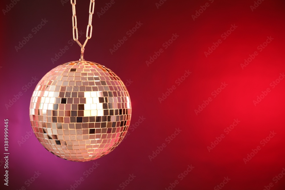 Obraz premium Shiny disco ball on color gradient background. Space for text