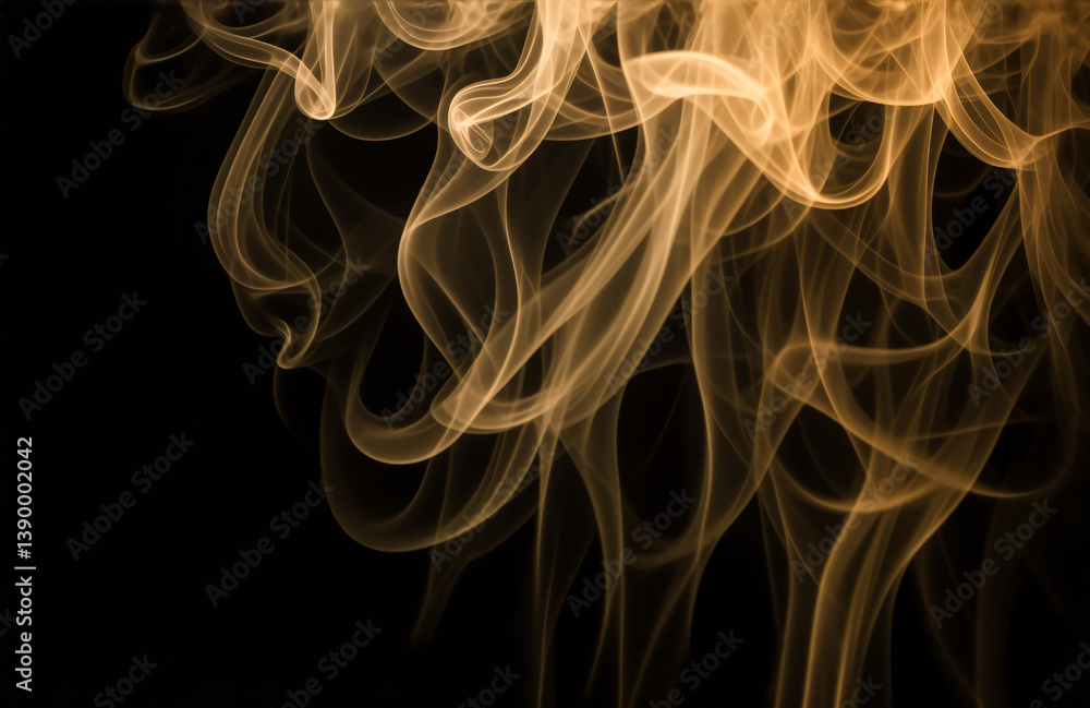 Obraz premium Swirling, golden-hued wisps of smoke dance against a stark black backdrop, creating an ethereal and abstract display, hint of movement and lightness.