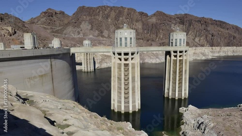 Intake towers stand tall at Hoover Dam, reflecting the impressive engineering against the backdrop of the arid Arizona landscape. Hoover Dam, Arizona, Nevada, USA