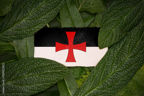 Quadro em tela Leaves with the flag of The Knights Templar 3D Rendering