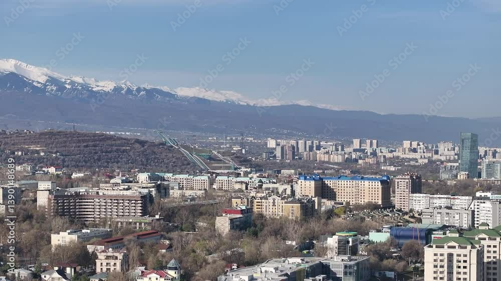 View from a quadcopter on the central part of the Kazakh city of Almaty in the early spring morning View from a quadcopter on the central part of the Kazakh city of Almaty in the early spring morning