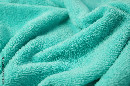 green towel fabric texture background close up