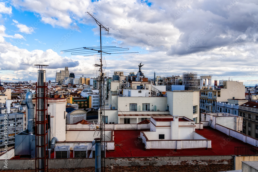 A beautiful rooftop view of Madrid skyline, including iconic architecture along the Gran Via. A beautiful rooftop view of Madrid skyline, including iconic architecture along the Gran Via.