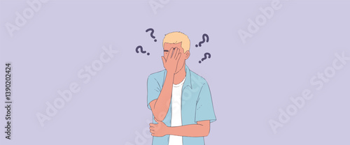 young man with his hand covering his face conveying uncertainty and contemplation