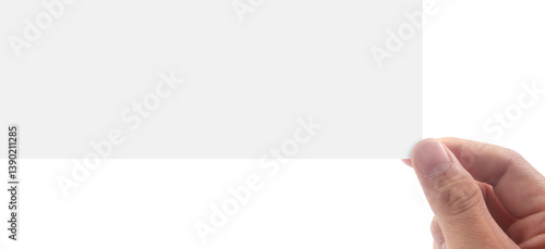 Hand holding blank card studio setting product photography minimalist environment close-up viewpoint marketing concept