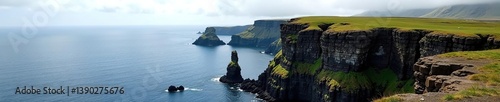 Rugged cliffs and basalt rock formations at Arnarstapi overlooking the Atlantic Ocean in West-Iceland,  basalt rocks,  dramatic