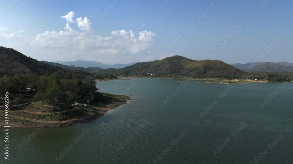 4K video high angle view of mountain amidst nature forest and water 4K video high angle view of mountain amidst nature forest and water