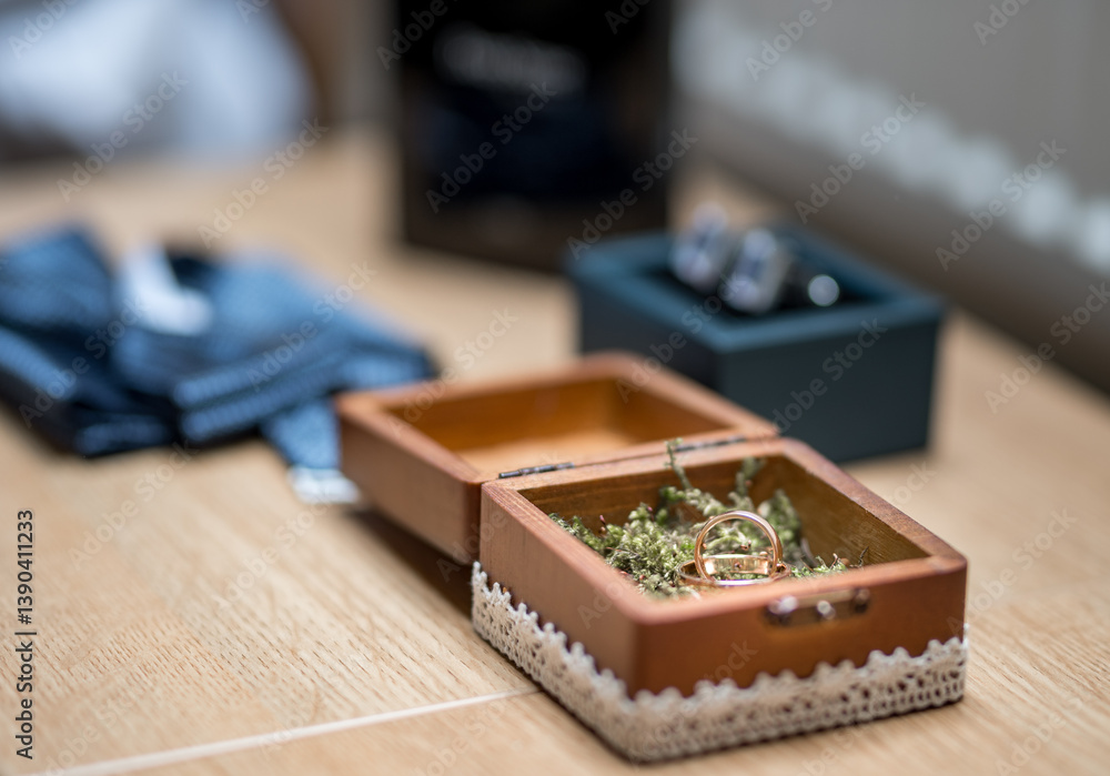Fototapeta premium Wooden Box with Wedding Ring and Decorative Background Display