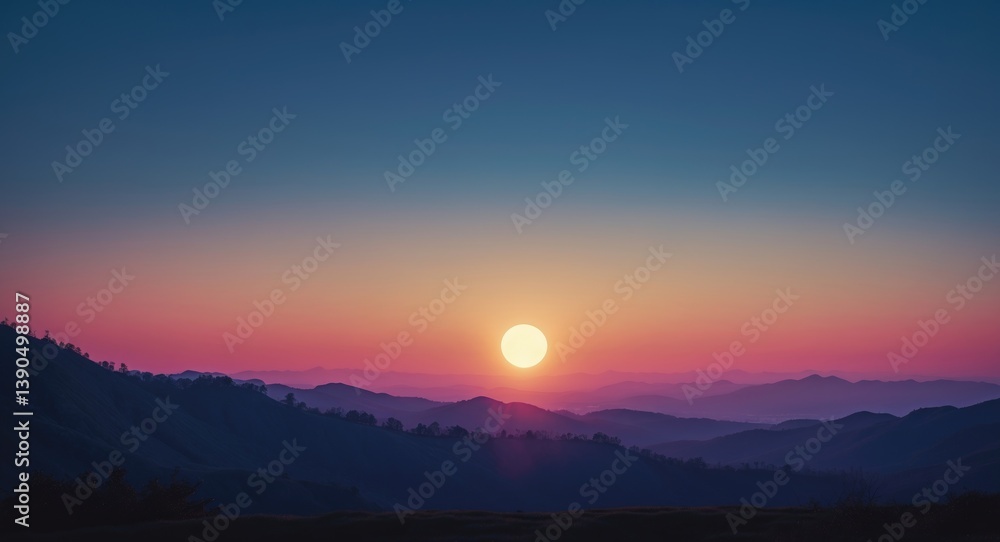 Obraz premium Sun illuminating the sky from behind a range of hills in the distance.