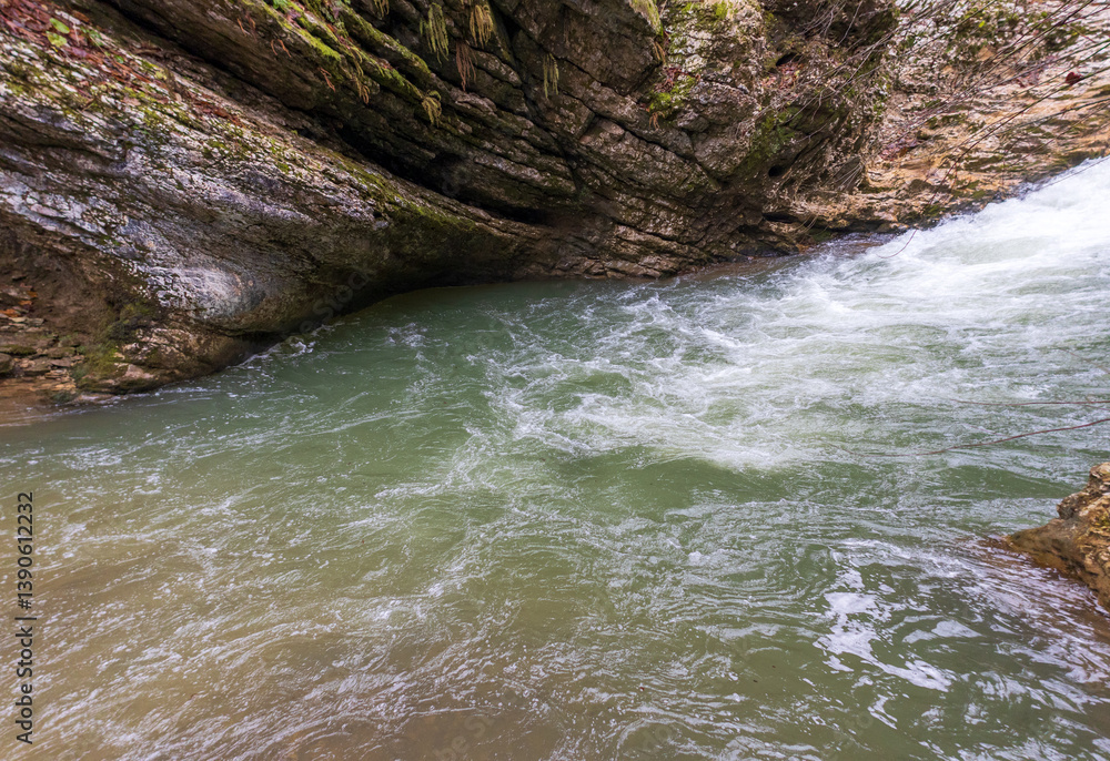 Fototapeta premium bottom structure and daytime walks along the canyon of the mountain river located in the gorge of the mountain range